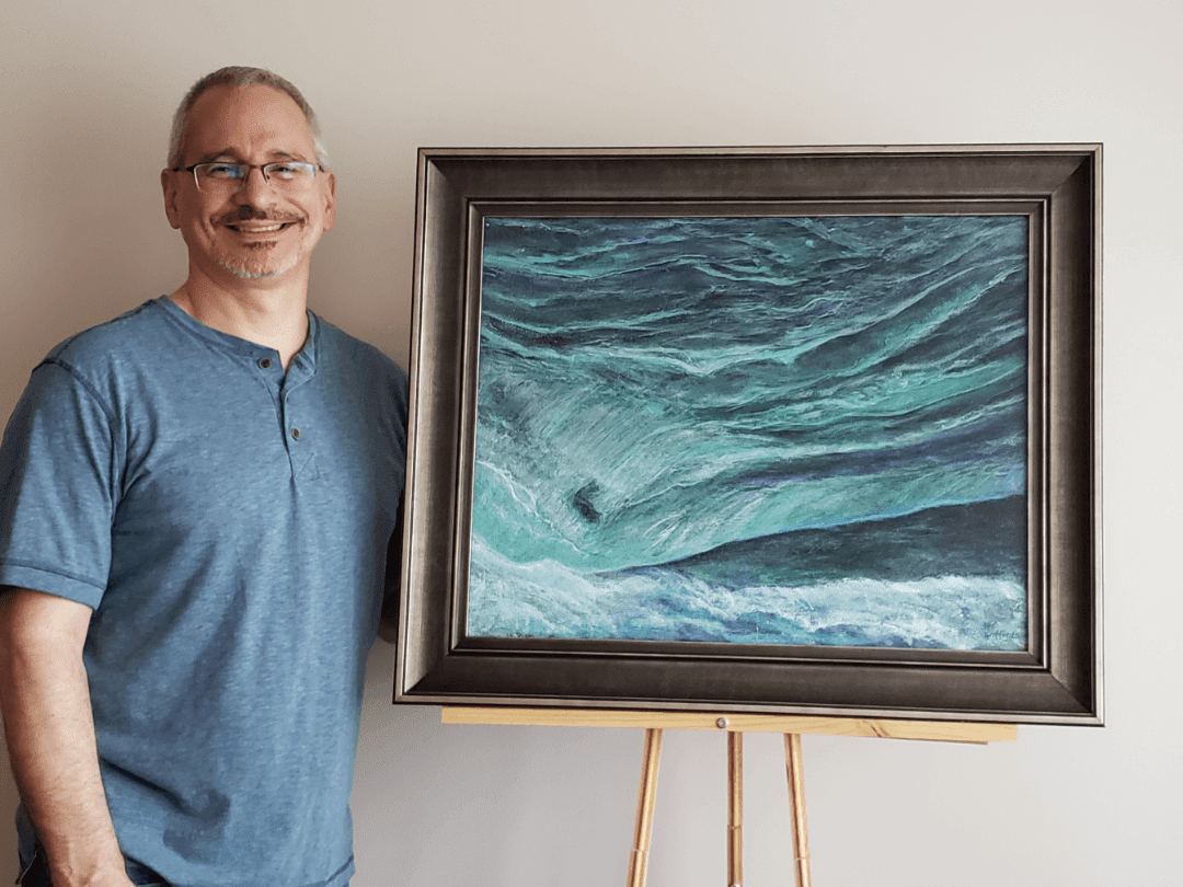 Image of Joe Loffredo with a print of the Waterfront painting, https://joe-loffredo.pixels.com/art